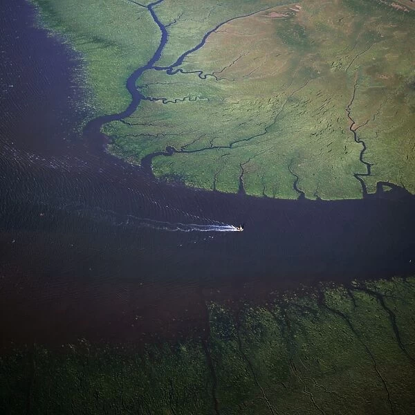 Aerial image of East Anglia, England, UK: Mouth of River Great Ouse entering The Wash, King's Lynn, Norfolk