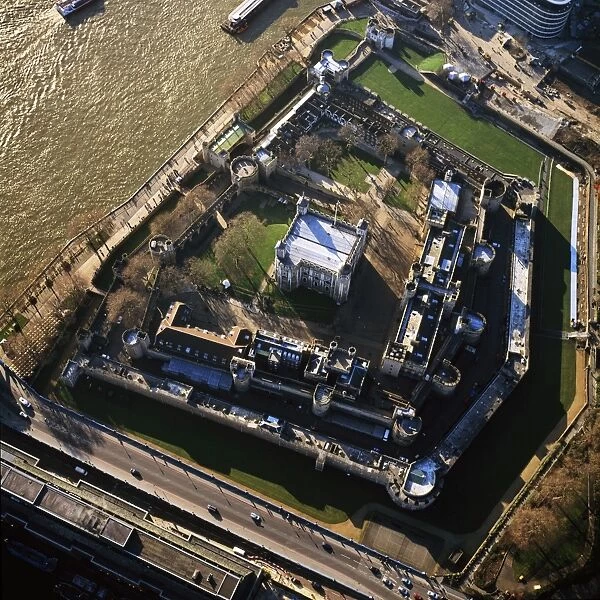Aerial image of London, England, UK: Tower of London (Her Majesty's Royal Palace and Fortress), a historic fortress and scheduled monument on the north bank of the River Thames