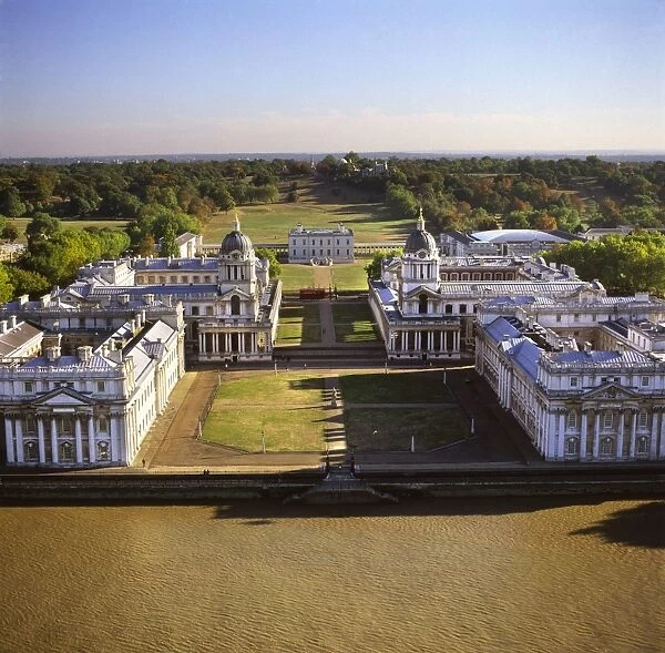 Aerial image of London, England, UK: Royal Naval College and Queen's House, on the south bank of the River Thames. Royal Observatory is in the background, Greenwich