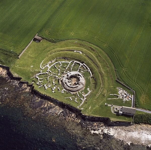 Aerial image of Scotland, UK: The Broch of Gurness, an Iron Age broch with a surrounding settlement on the northwest coast of Mainland Orkney