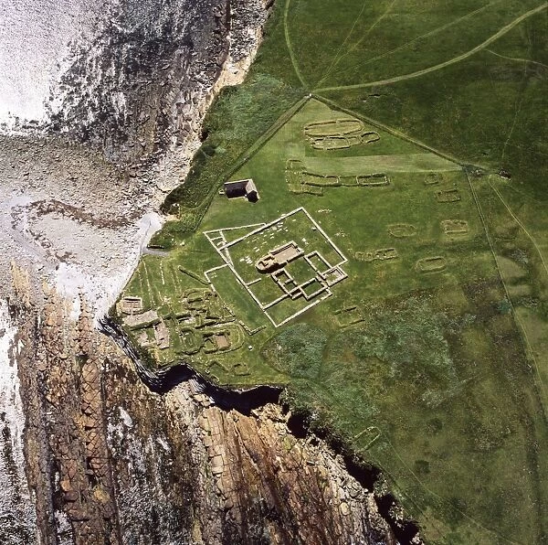 Aerial image of Scotland, UK: Brough of Birsay, a small uninhabited tidal island off the north west coast of Mainland Orkney, north west coast of Orkney Mainland. The remains of Pictish and Norse settlements and a 12th century church can be seen