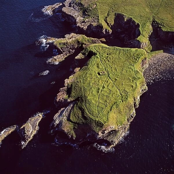 Aerial image of Scotland, UK: Brough of Deerness, Mull Head, Mainland Orkney - Remains of a 10th century chapel in a spectacular headland setting on the eastern tip of Deerness