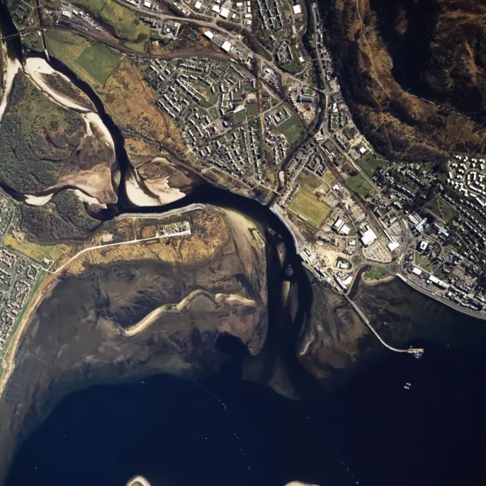 Framed Print : Aerial image of Scotland, UK: Fort William, the largest town in the highlands of Scotland, lies at the southern end of the Great Glen, on the shores of Loch Linnhe and Loch Eil Framed Print : Aerial image of Scotland, UK: Fort William, the largest town in the highlands of Scotland, lies at the southern end of the Great Glen, on the shores of Loch Linnhe and Loch Eil
