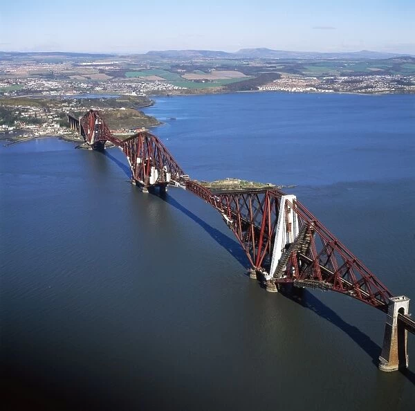 Aerial image of Scotland, UK: The Forth Bridge (Forth Rail Bridge or Forth Railway Bridge), a cantilever, railway bridge over the Firth of Forth (estuary of firth) in the east of Scotland, Lowlands, Scotland