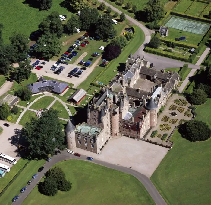 Framed Print : Aerial image of Scotland, UK: Glamis Castle, was the childhood home of Elizabeth Bowes-Lyon (the Queen Mother), village of Glamis, Angus, Scotland Framed Print : Aerial image of Scotland, UK: Glamis Castle, was the childhood home of Elizabeth Bowes-Lyon (the Queen Mother), village of Glamis, Angus, Scotland