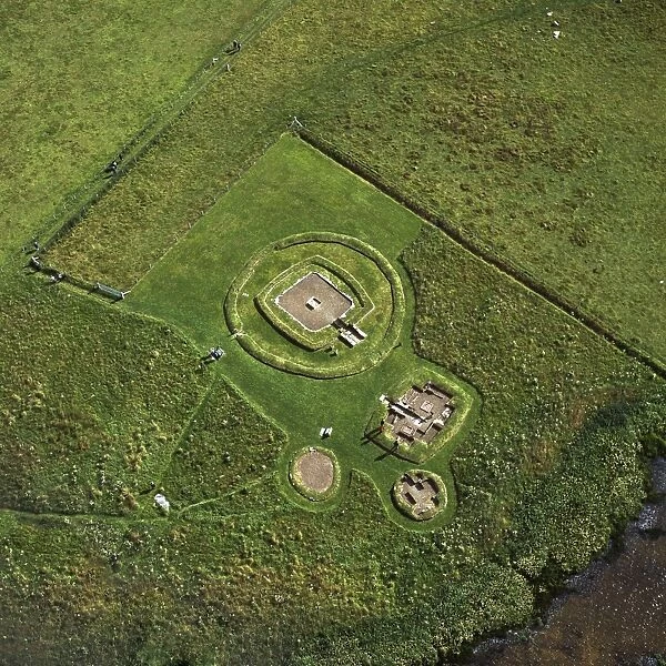Aerial image of Scotland, UK: The Neolithic Barnhouse Settlement, sited by the shore of Loch of Harray, Orkney Mainland, Scotland