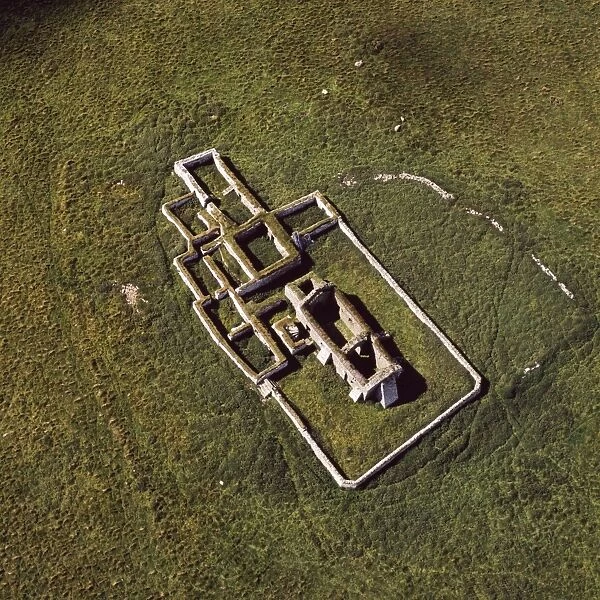Aerial image of Scotland, UK: Ruined Church, Eynhallow, a small uninhabited island lies in Eynhallow Sound between Mainland, Orkney and Rousay, Orkney Islands, Scotland