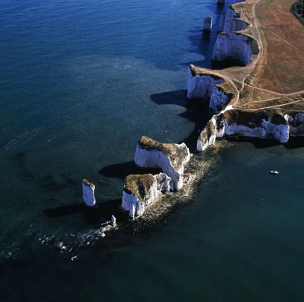 Aerial image of South (Southern) England, UK: Old Harry Rocks, chalk stacks located directly east of Studland, north of Swanage, Dorset