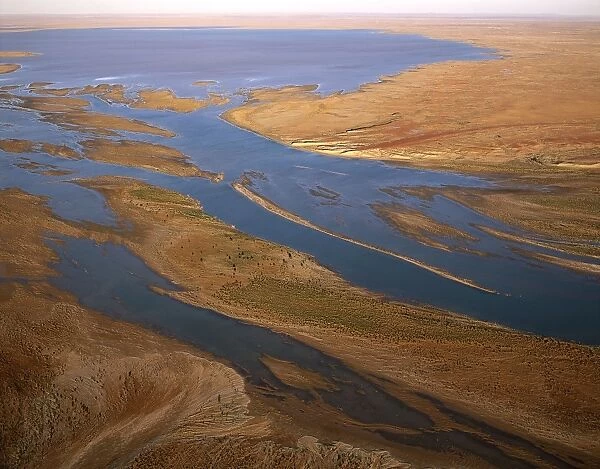 Aerial - Margaret River flowing into L. Eyre South Lake Eyre National Park, South Australia JPF46553