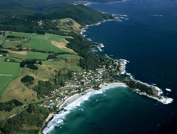 Aerial - Sisters Beach and farmland north coast Tasmania, Australia JPF49103