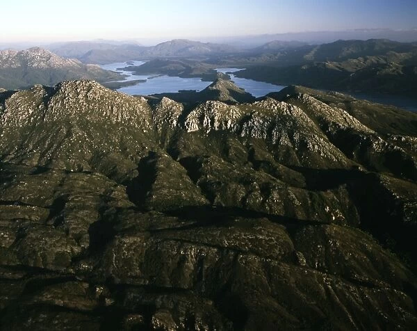Aerial - SW Cape Mountain Range, Bathurst harbour Southwest National Park, Tasmania (World Heritage Area), Australia JPF49804