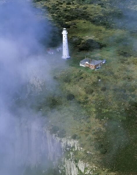 Aerial - Tasman Island and lighthouse Tasman Peninsula, Tasmania, Australia