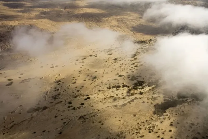Framed Print : Aerial view of mist rolling in from the cold Atlantic Ocean over the Namib Desert Plains - Namib Desert - Namibia - Africa Framed Print : Aerial view of mist rolling in from the cold Atlantic Ocean over the Namib Desert Plains - Namib Desert - Namibia - Africa