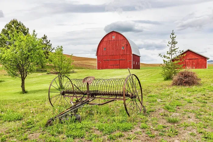 Framed Print : Albion, Washington State, USA. Red barns and antique farm equipment in the Palouse hills. (Editorial Use Only) Date: 23-05-2021 Framed Print : Albion, Washington State, USA. Red barns and antique farm equipment in the Palouse hills. (Editorial Use Only) Date: 23-05-2021