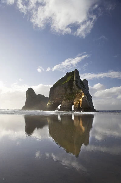 Archway Islands Reflected in Wet Sands of