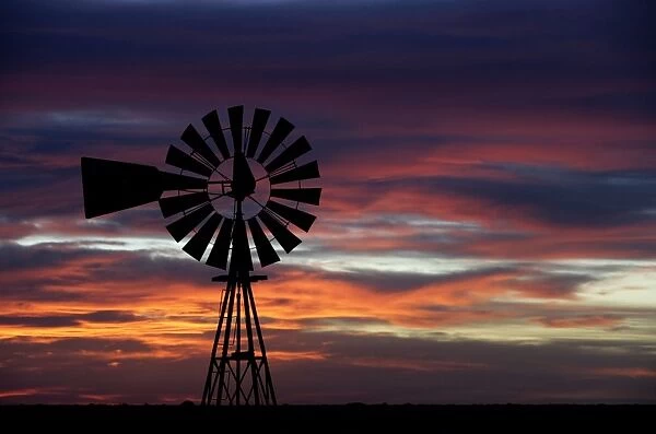 Argentina, Patagonia, Province Chubut Windmill on the steppe, at sunset. Valdes Peninsula