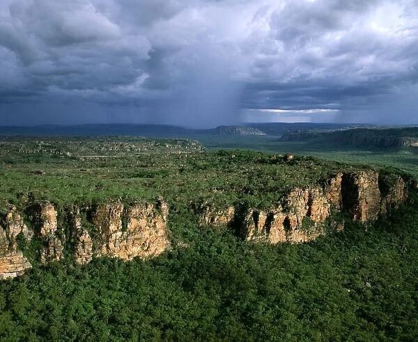 Arnhemland Escarpment with tropical rain storm approaching, wet season (January). Sandstone: Kombolgie Formation (early Proterozoic: 1700Ma), Kakadu National Park (World Heritage Area), Northern Territory, Australia JPF51141