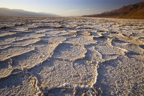 Badwater - rough salt crusts in the salt flats of Badwater, the lowest point in the whole US, at early morning - Death Valley National Park, California, USA