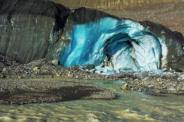 Blue ice and meltwater at the toe of the Athabasca Glacier, Jasper National Park, Alberta, Canada Date: 25-05-2021