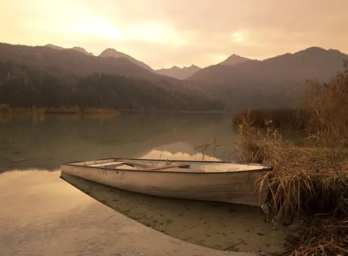 Framed Print : Boat at lake in the bavarian mountains in autumn Weissensee, Bavaria, Germany Framed Print : Boat at lake in the bavarian mountains in autumn Weissensee, Bavaria, Germany