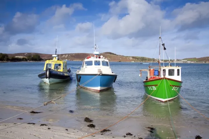 Framed Print : Boats Moored at Bryher - Isles of Scilly - Tresco beyond - UK Framed Print : Boats Moored at Bryher - Isles of Scilly - Tresco beyond - UK