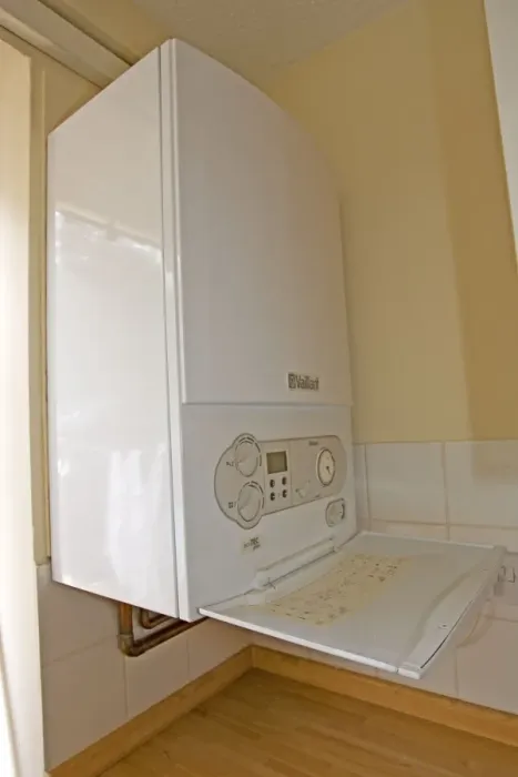 Framed Print : Bolier - Vaillant EcoTec Plus modern combination or compact combi boiler installed in small flat produces instant hot water UK Framed Print : Bolier - Vaillant EcoTec Plus modern combination or compact combi boiler installed in small flat produces instant hot water UK