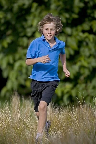 Boy Running in Field - Age 10