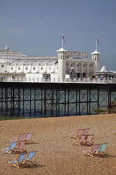 Brighton Pier (c. 1899), and beach chairs, Brighton