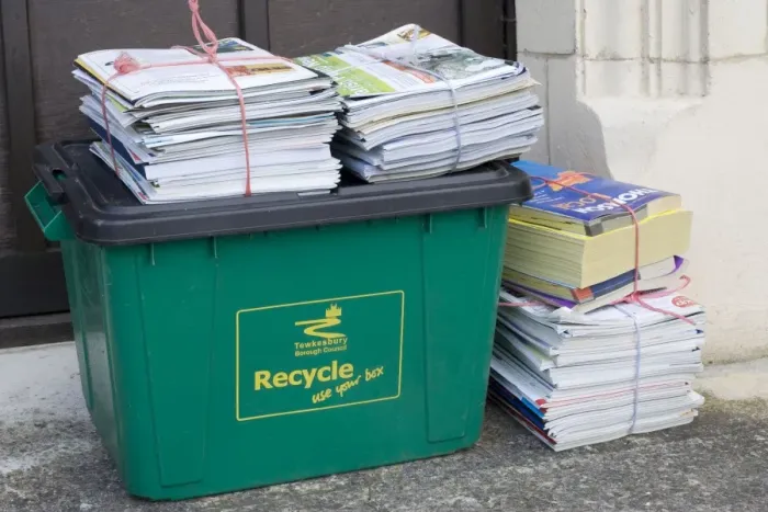 Framed Print : Bundles of magazines and newspapers neatly tied and left for recycling on green bin Cotswolds UK Framed Print : Bundles of magazines and newspapers neatly tied and left for recycling on green bin Cotswolds UK
