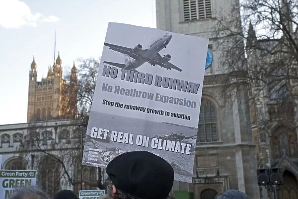Campaigners with banner no third runway on Climate
