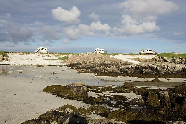 Camper vans parked near beach at Fidden Farm on south coast of Isle of Mull, Scotland, UK