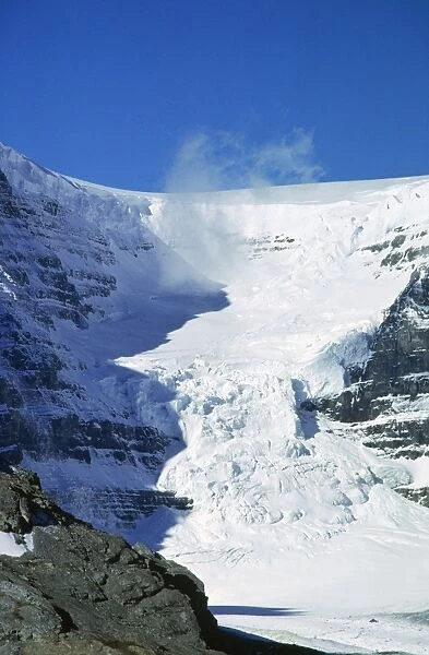 Canada - Dome Glacier showing icefall / snowfall from cirque icefield parkway. Jasper National Park, Alberta