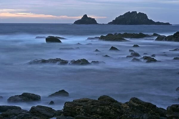 Cape Cornwall at low tide with high tide coming in Cape Cornwall, Cornwall, England, UK