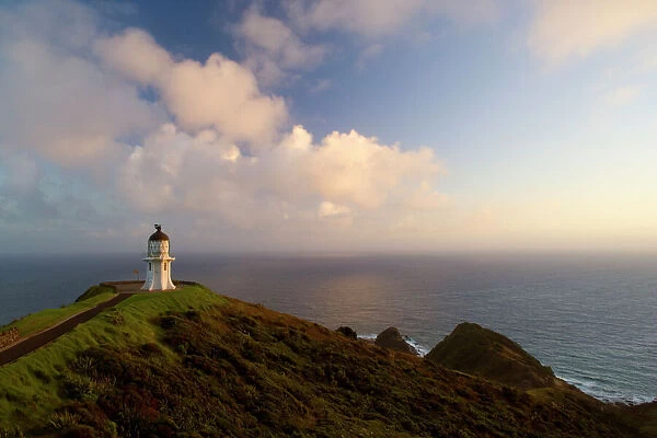 Cape Reinga northernmost tip of New Zealand with Cape Reinga Lighthouse in first morning light Northland, North Island, New Zealand