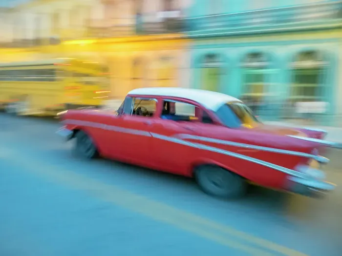 Framed Print : Caribbean, Cuba, Havana, Havana Vieja, UNESCO World Heritage Site, classic car in motion Date: 31-01-2017