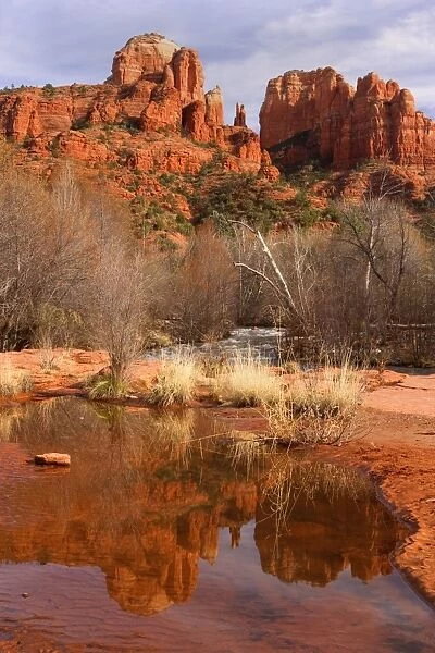 Cathedral Rock - view of the west face of Cathedral Rock across Oak Creek. Spring melt had caused Oak Creek to flood over and created a huge pool in which Cathedral Rock casts a perfect reflection