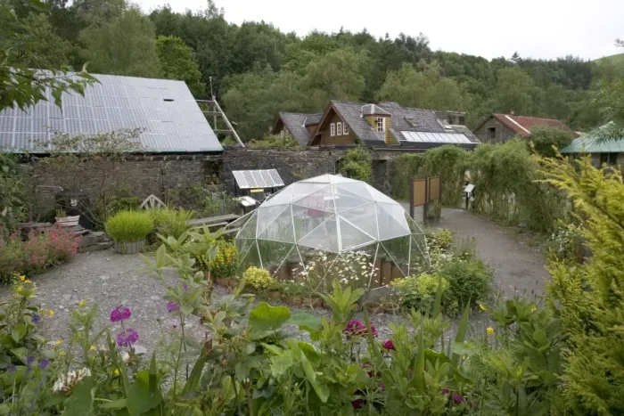 Framed Print : Centre for Alternative Technology, UK - situated in an old slate quarry at Machynlleth in Mid-Wales the centre demonstrates a wide range of sustainable systems. This image shows a greenhouse, low energy house and photovoltaic roof Framed Print : Centre for Alternative Technology, UK - situated in an old slate quarry at Machynlleth in Mid-Wales the centre demonstrates a wide range of sustainable systems. This image shows a greenhouse, low energy house and photovoltaic roof