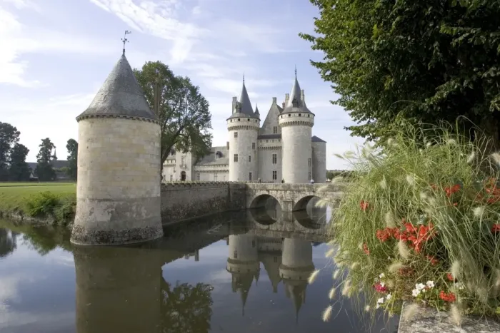 Framed Print : Chateau of Sully-sur-Loire, France - Towers of the classic medieval fortress of Chateau of Sully-sur-Loire. Built in the 14th century it is approached over a moat by a wooden walkway and drawbridge, France Framed Print : Chateau of Sully-sur-Loire, France - Towers of the classic medieval fortress of Chateau of Sully-sur-Loire. Built in the 14th century it is approached over a moat by a wooden walkway and drawbridge, France