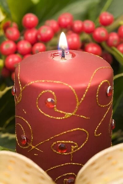 Christmas Candle and holly berries