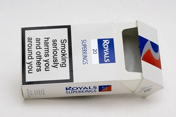 Cigarettes - Red white and blue packet of Royals Superkings cigarettes with smoking seriously damages health warning UK