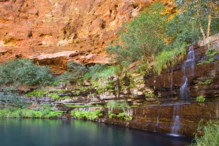 Framed Print : Circular Pool - water cascades down a steep, heavily with fern covered, terraced canyon wall into picturesque Circular Pool. The dark turquoise coloured water contrasts nicely with the bright red canyon walls Framed Print : Circular Pool - water cascades down a steep, heavily with fern covered, terraced canyon wall into picturesque Circular Pool. The dark turquoise coloured water contrasts nicely with the bright red canyon walls