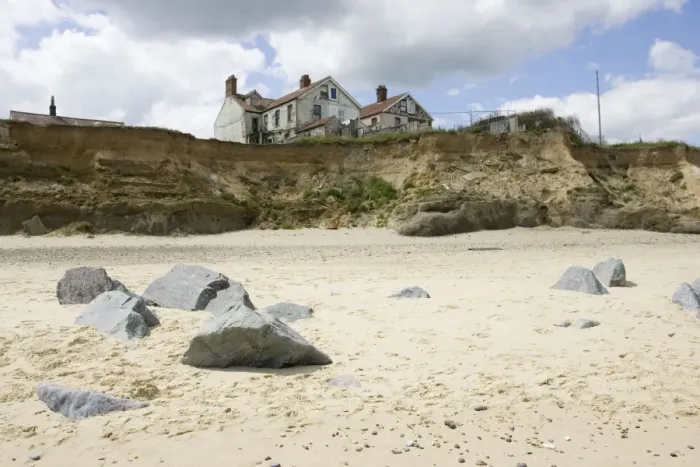 Framed Print : Collapsing houses on cliff edge severe coastal erosion Happisburgh North Norfolk Coast UK Framed Print : Collapsing houses on cliff edge severe coastal erosion Happisburgh North Norfolk Coast UK