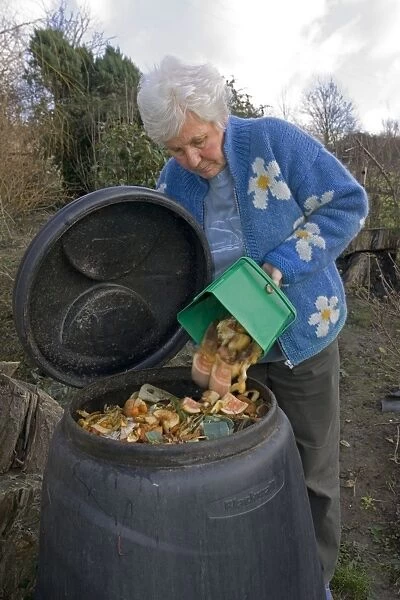 Compost - woman tipping variety of kitchen waste