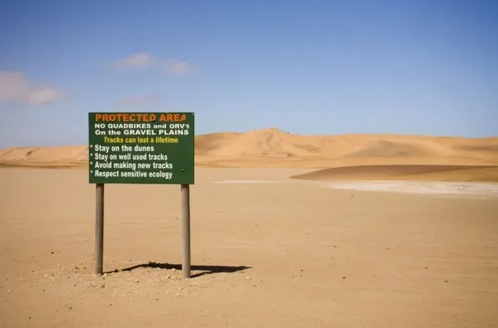 Framed Print : Conservation board at the begging of the Dune Sea - -Dune Fields - Namib Desert - Namibia - Africa Framed Print : Conservation board at the begging of the Dune Sea - -Dune Fields - Namib Desert - Namibia - Africa
