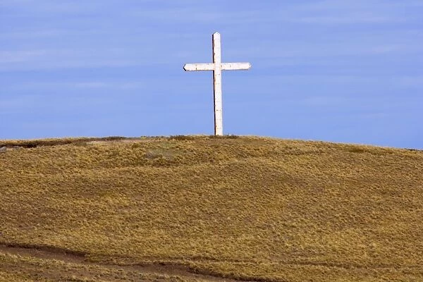 Cross - a giant cross mounted on a hill in the