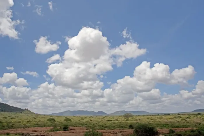 Framed Print : Cumulus cloud formations from Mudunda Rock Tsavo East National Park Kenya
