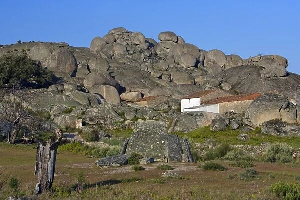 Dolmen Burial chamber - from Megalithic era, standing amongst granite boulders, beside San Vincente Alcantara, Extremadura, Spain