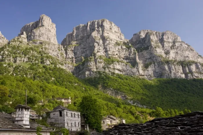 Framed Print : The dramatic limestone cliffs of Astraka mountain, towering above Micro Papingo village, Vikos Gorge National Park, north Greece Framed Print : The dramatic limestone cliffs of Astraka mountain, towering above Micro Papingo village, Vikos Gorge National Park, north Greece