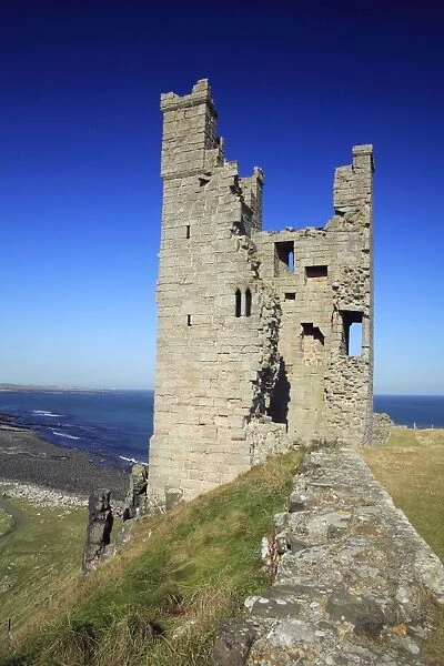 Dunstanburgh Castle - Lilburn Tower and North Sea coastline, Northumberland National Park, England