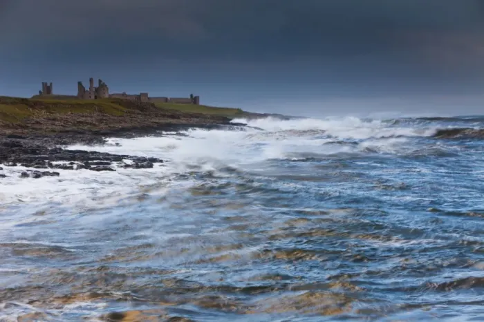 Framed Print : Dunstanburgh Castle - stormy North Sea - autumn - Northumberland National Park - England